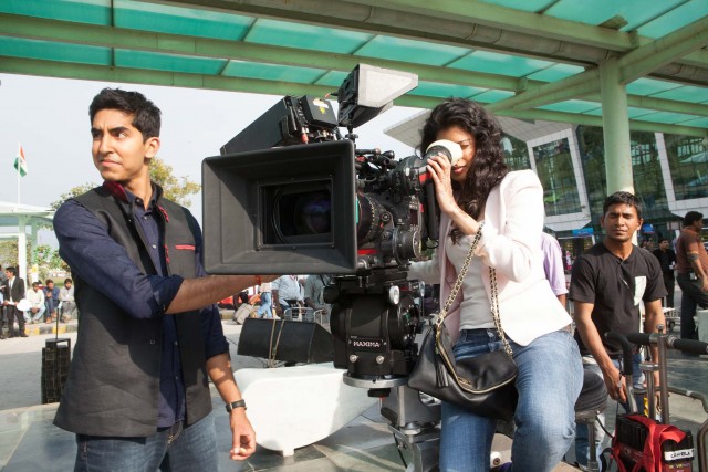 Dev Patel and Tina Desai on the set of THE SECOND BEST EXOTIC MARIGOLD HOTEL. Photo: Laurie Sparham. © Fox Searchlight.