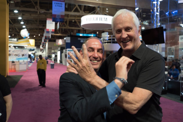 Garret Brown, Inventor of the Steadicam  and Steve Tiffen celebrating at the Tiffen Booth-- NAB 2015